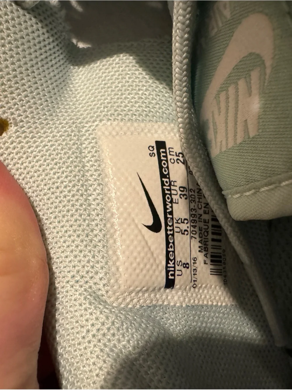 Nike Women’s Mint Green Lace-Up Sneakers